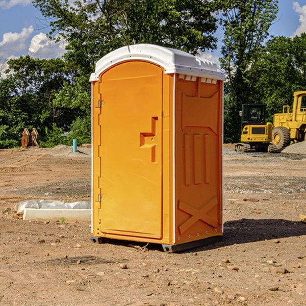 how often are the porta potties cleaned and serviced during a rental period in Denning